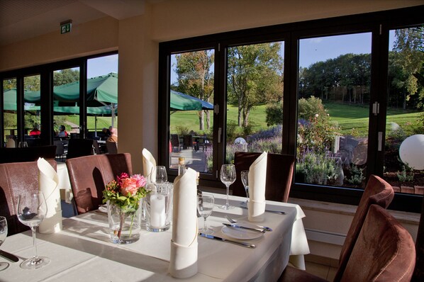 Breakfast served, local and international cuisine, golf course views 