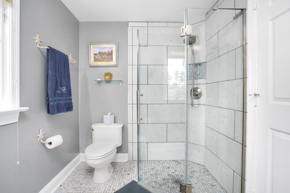 Bathtub, hair dryer, towels