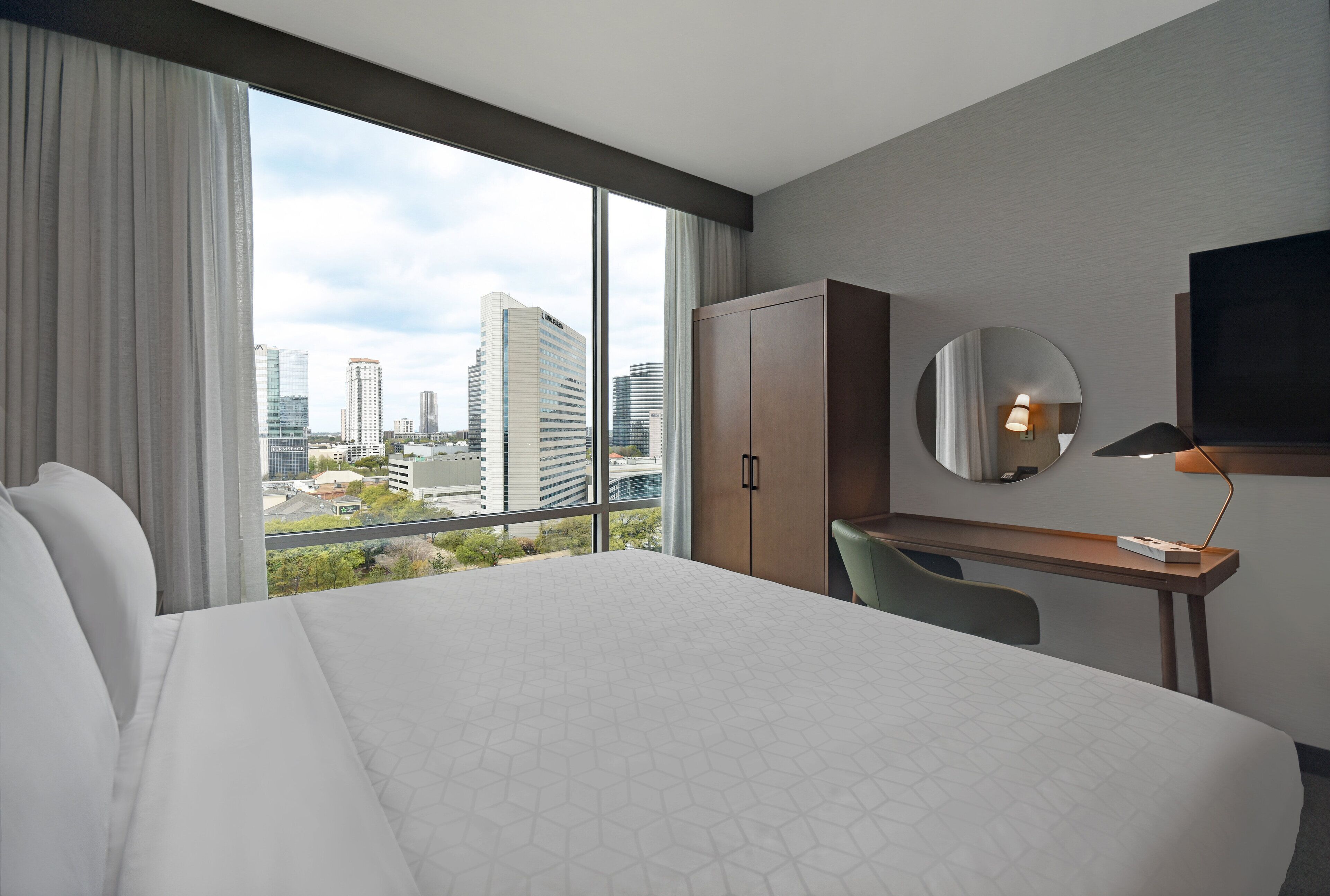 studio suite, 1 king bed, kitchen, city view | 1 bedroom, free wifi, bed sheets