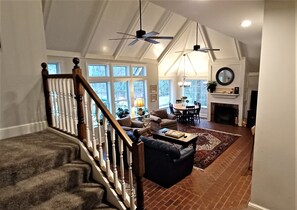 Smart TV, fireplace, ping pong, books