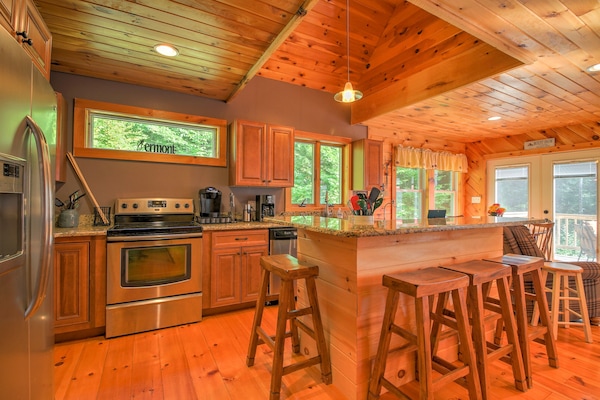 Kitchen has great appliances and a breakfast bar.