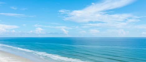 Espreguiçadeiras, toalhas de praia