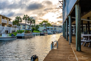 Enjoy waterfront views from the hotel's deck, which offers access to the water via a metal ladder.