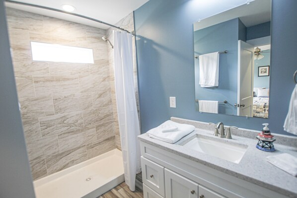 Shower, towels, toilet paper
