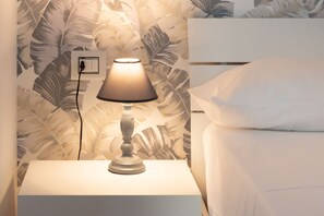 4 habitaciones, tabla de planchar con plancha y cuna de viaje 