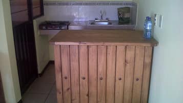 Habitación cuádruple básica | Cocineta privada