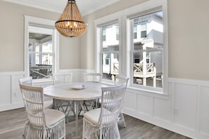 Enjoy meals in this dining area with a round table and six comfortable chairs.