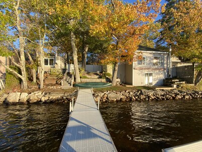 Lakeside house with a separate bunkhouse