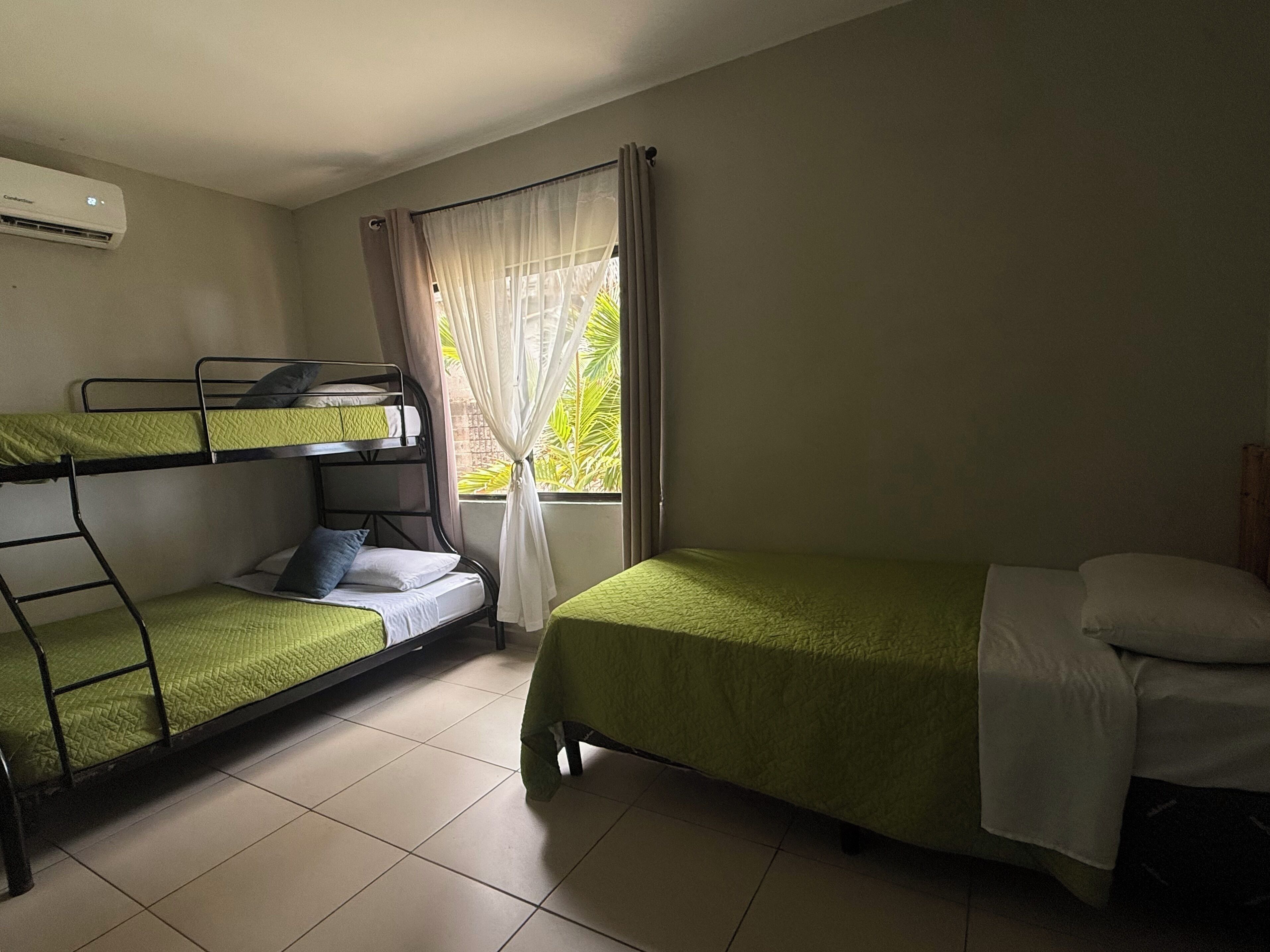 Standard Quadruple Room, Garden View | Premium bedding, down comforters, free WiFi, bed sheets