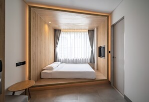 Premium bedding, memory-foam beds, blackout curtains, free WiFi