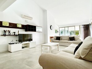 TV, fireplace - Isabella, spacious modern villa with sea views from balconies, spa-style pool, within 5mins walk of beach where there are beach bars and restaurants (L'Ametlla de Mar)