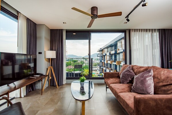 Suite Familiale | Minibar, coffres-forts dans les chambres, rideaux occultants