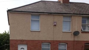 A two-story house with a red brick lower floor and a beige upper floor. There are two windows on the upper floor and one on the lower floor. - Worcester Town Centre Home & Garden (Worcester)