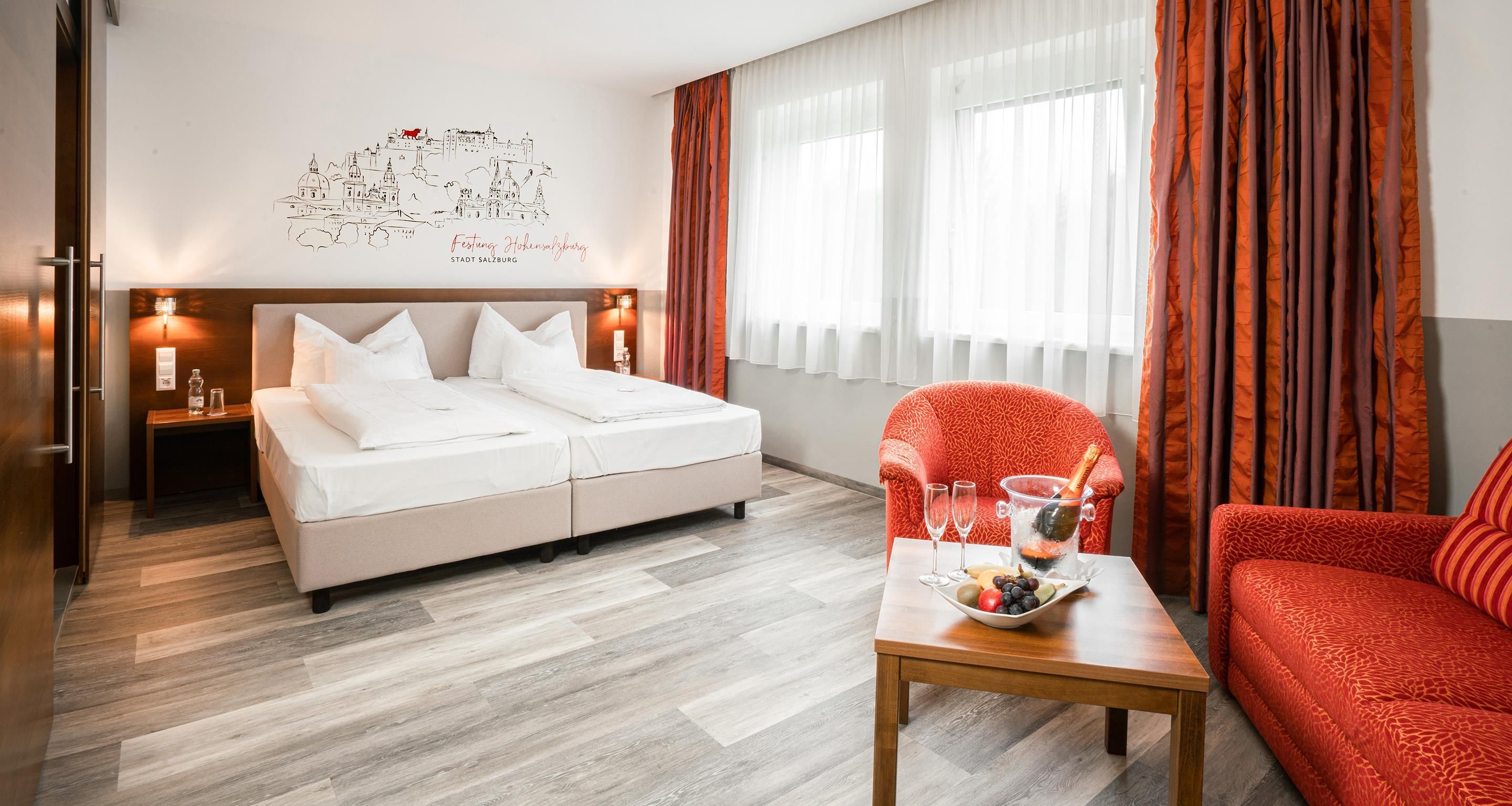 Junior Suite, 2 Twin Beds, Bathtub (Cozy Sitting Corner;Quiet Location) | In-room safe, desk, laptop workspace, blackout drapes