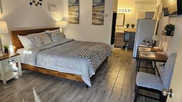 Classic Room, 1 King Bed, Non Smoking, Refrigerator & Microwave | Free WiFi, bed sheets