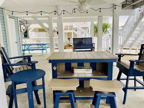 Outdoor dining - Beautiful home on the channel in Cherry Grove ~ Pool coming August 2025!!! (North Myrtle Beach)