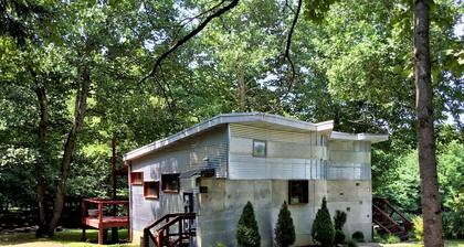 One of a kind cabin in the woods. Quiet and private but close to everything.