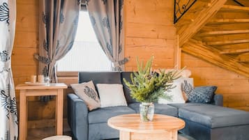Deluxe Chalet, Mountain View | Living room | Flat-screen TV