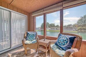 Screened in porch overlooking lake