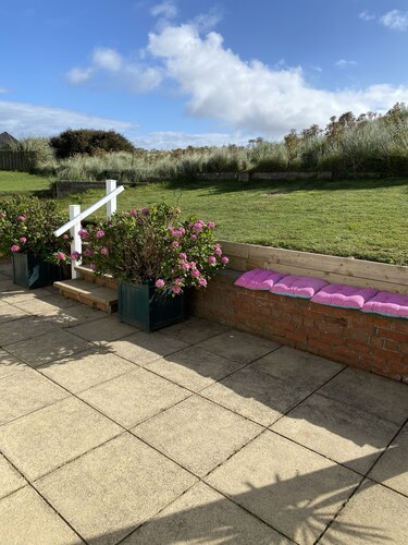 Beadnell Fantastic Bungalow - garden backs straight onto dunes and beach.