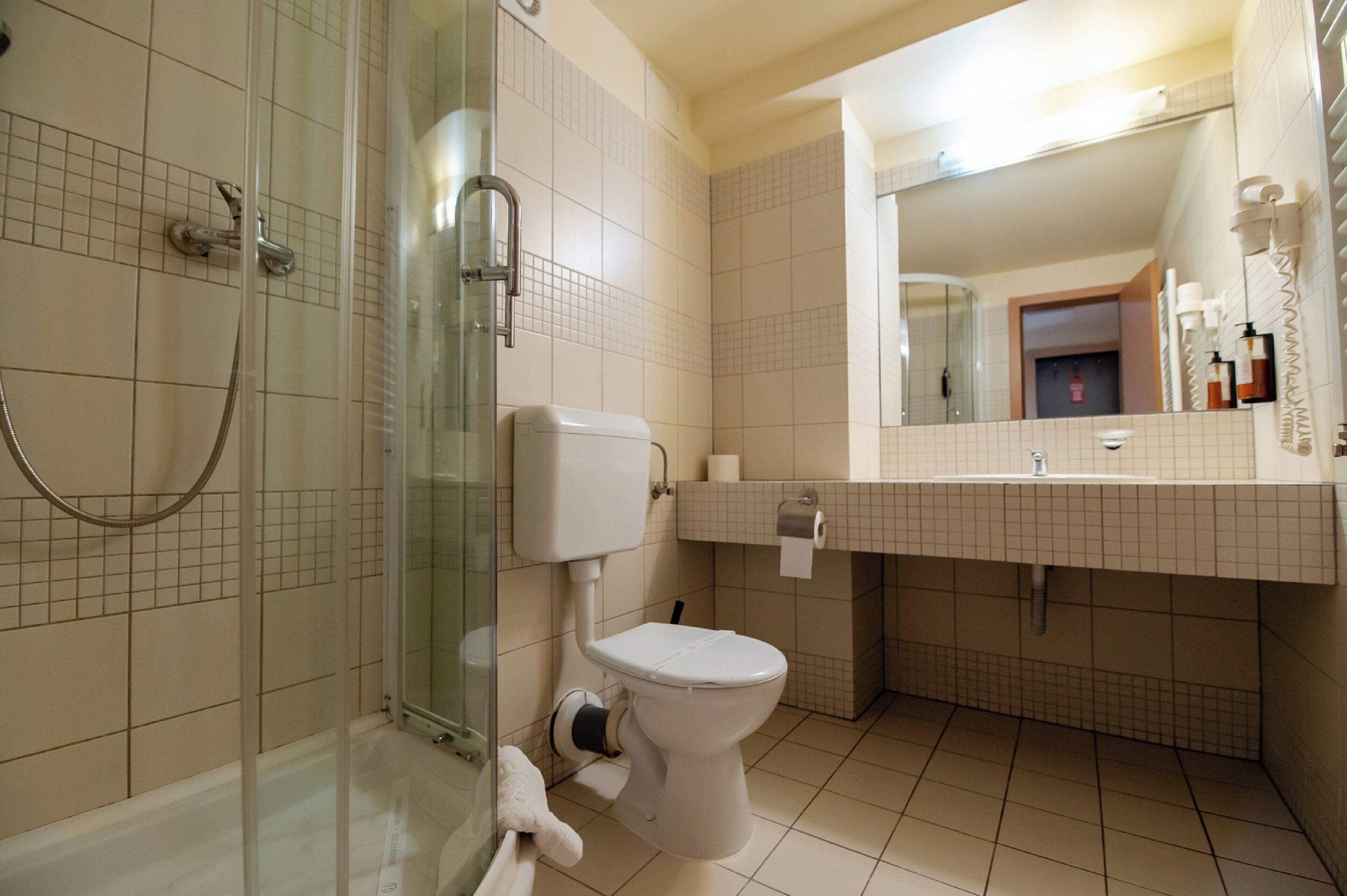 hair dryer, slippers, towels