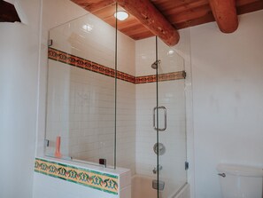 Combined shower/tub, hair dryer, towels, soap