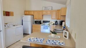 Fridge, microwave, oven, stovetop - 🌟 Modern House Minutes from Downtown Gainesville, UF, VA & More! 🏡✨ (Gainesville)