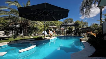 2 outdoor pools, a heated pool, open 9:30 AM to 6:00 PM, pool umbrellas