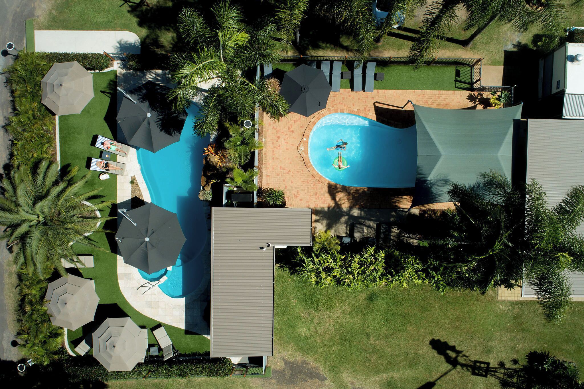 2 outdoor pools, a heated pool, open 9:30 AM to 6:00 PM, pool umbrellas