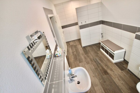 Shower, towels, toilet paper