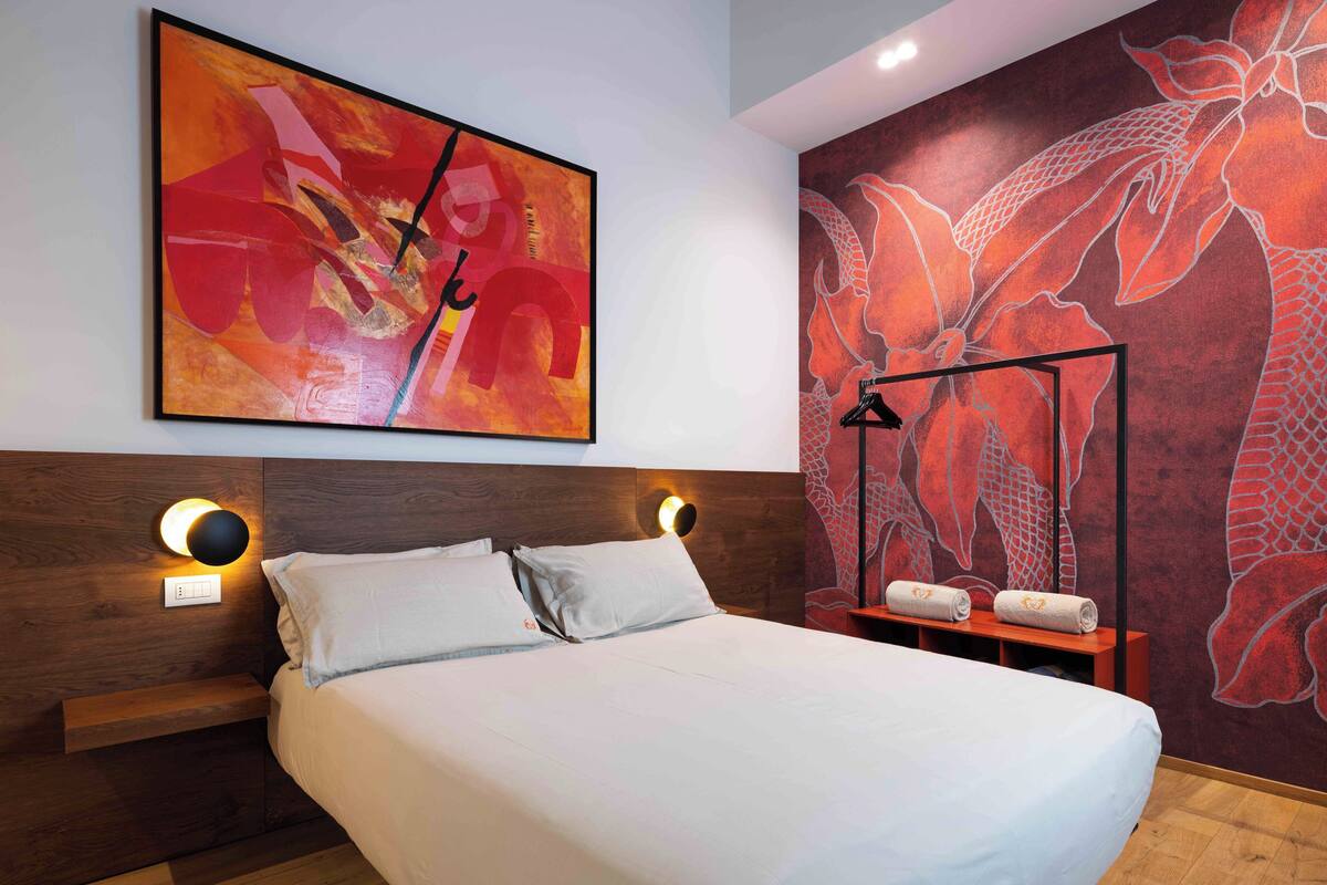 Deluxe Apartment, 2 Bedrooms, City View (Mazzotti) | Premium bedding, down comforters, Select Comfort beds, minibar