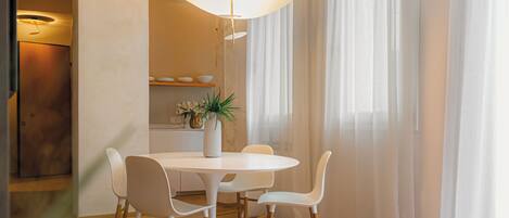 Exclusive Apartment (Bomben) | Living area | Flat-screen TV