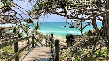 On the beach, sun-loungers, beach towels