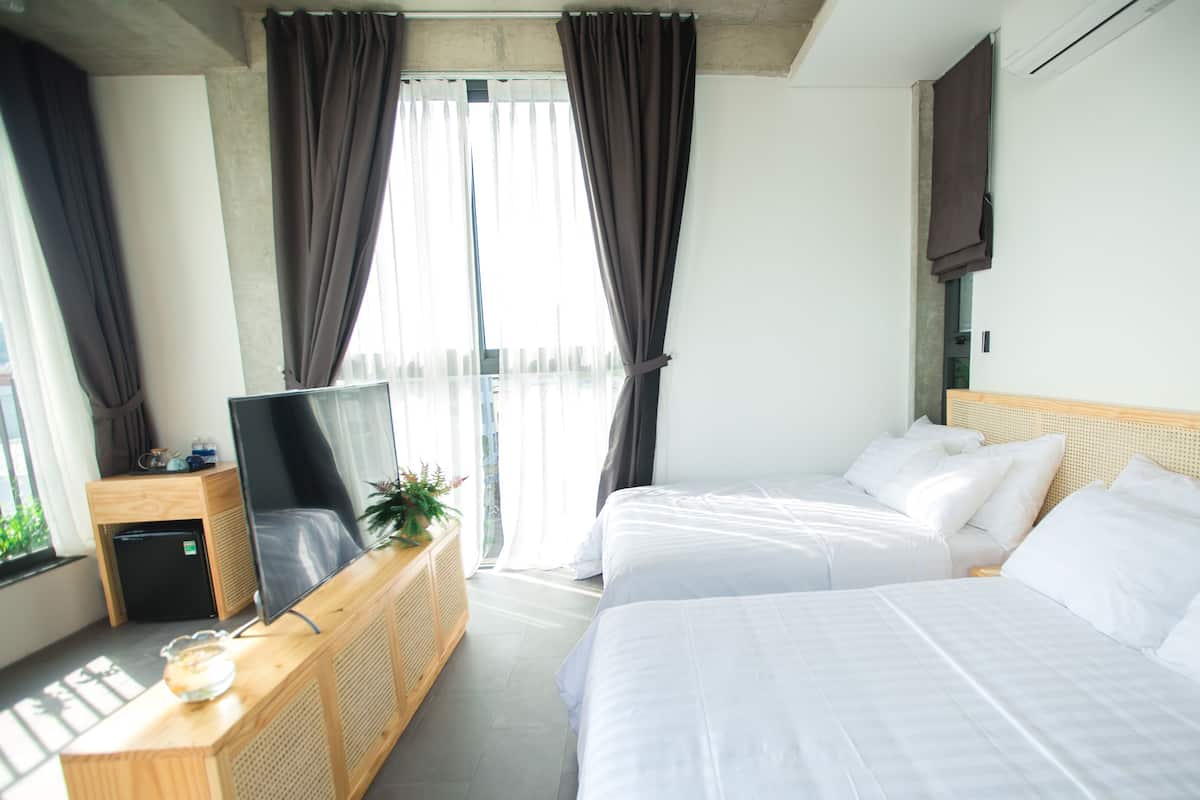 Deluxe-værelse til 4 personer | Select Comfort-senge, minibar, skrivebord