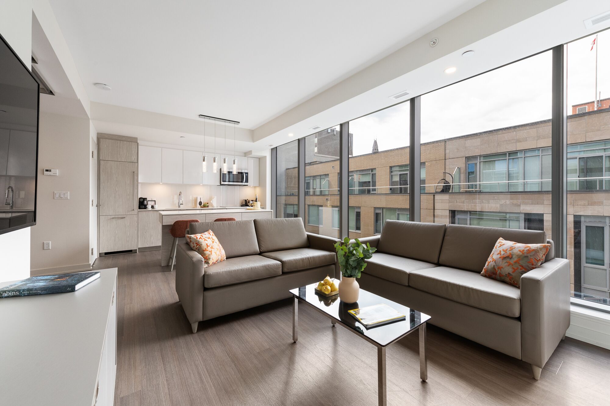 suite (signature large two bedroom balcony) | living area | 55-inch tv with satellite channels, streaming services