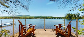 Homey lakeside property w/ one house, two cottages, mtn. views, & private beach