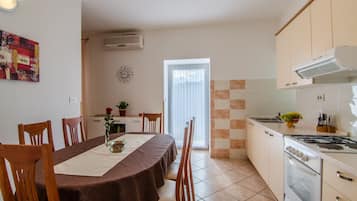 Fridge, oven, electric kettle, cookware/dishes/utensils