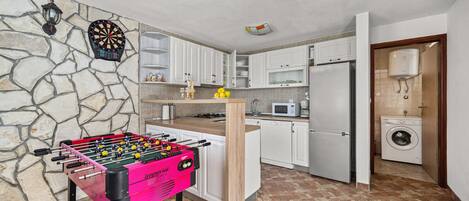 Fridge, oven, electric kettle, cookware/dishes/utensils