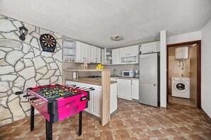 Fridge, oven, electric kettle, cookware/dishes/utensils