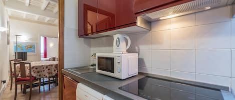 Apartment, 1 Bedroom | Private kitchenette | Fridge, microwave, stovetop, dishwasher