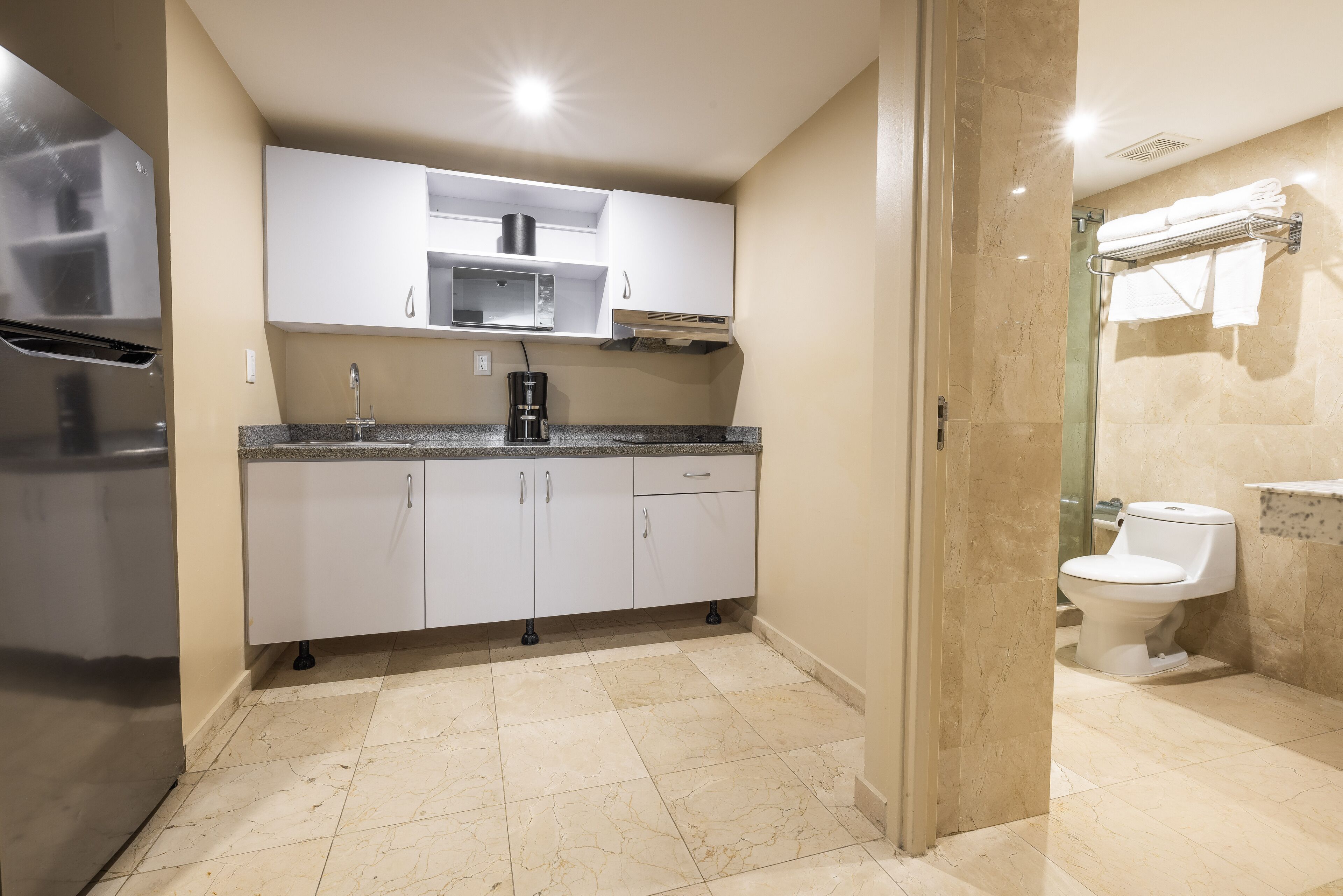 microwave, coffee/tea maker, dining tables