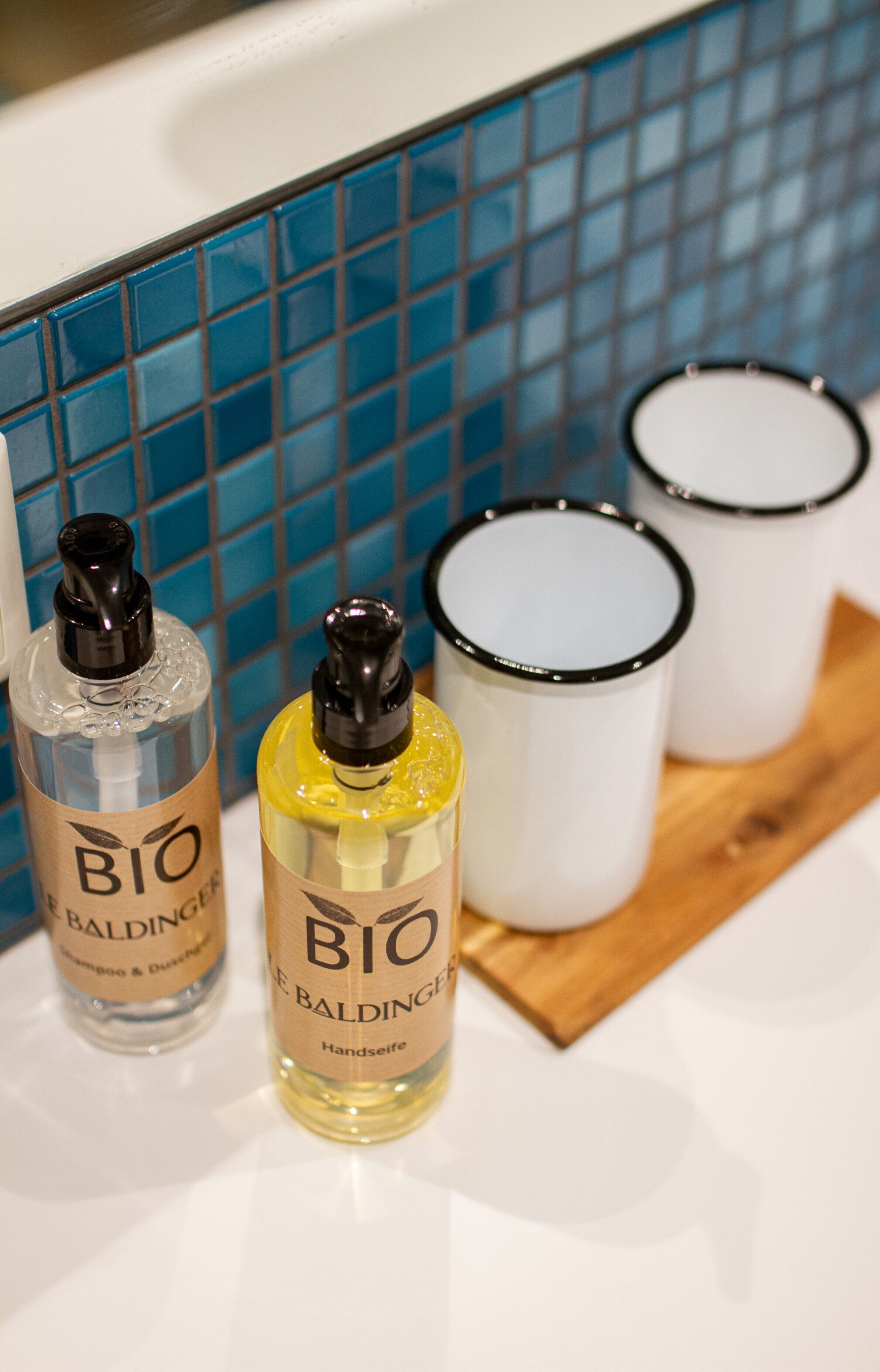 deluxe double room | bathroom | shower, rainfall showerhead, free toiletries, hair dryer