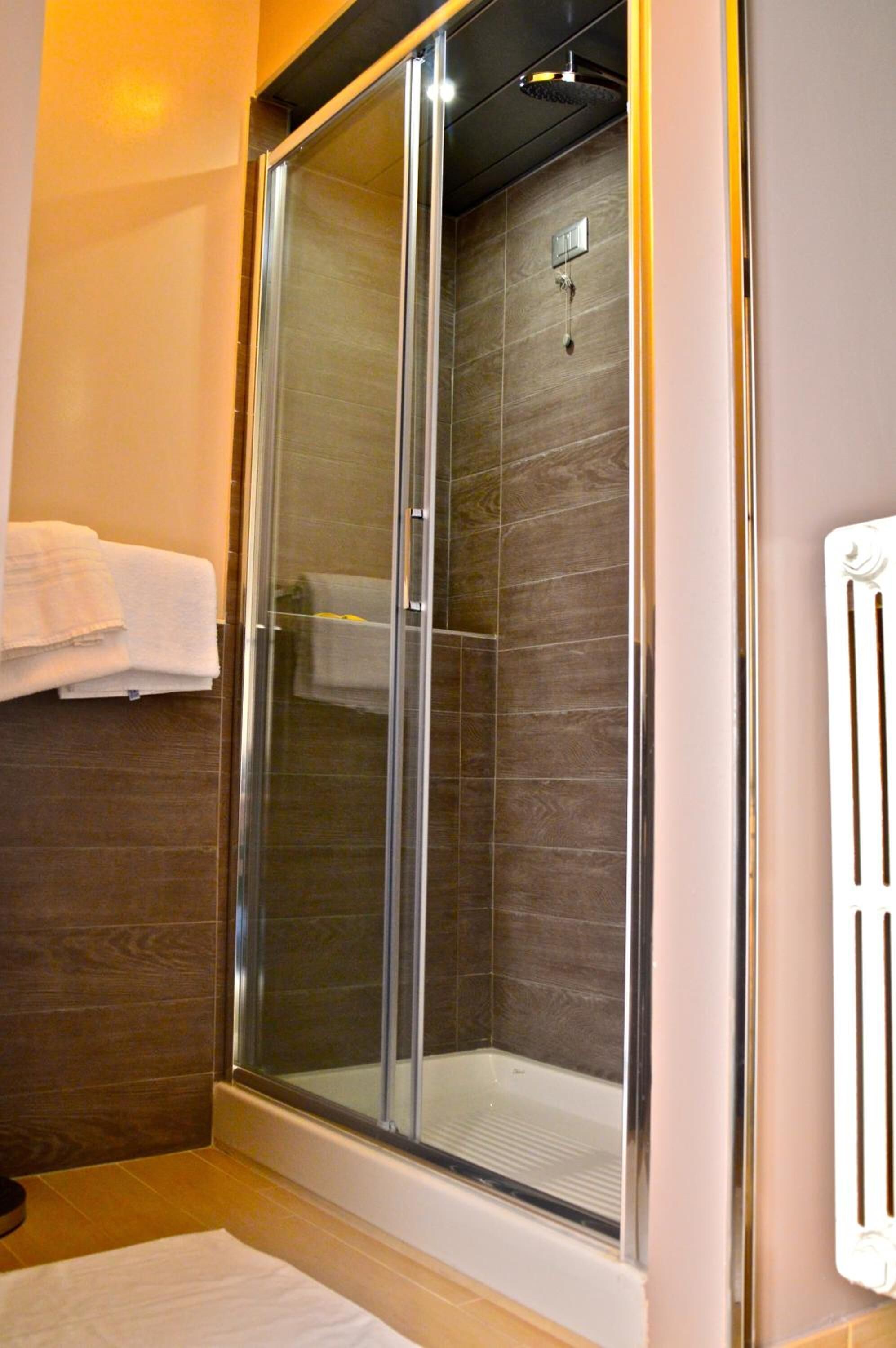 shower, free toiletries, hair dryer, slippers