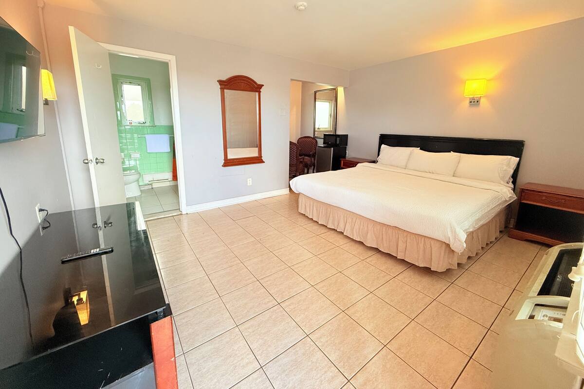 Chambre simple Deluxe, 1 très grand lit | 1 chambre, espace de travail pour ordinateurs portables