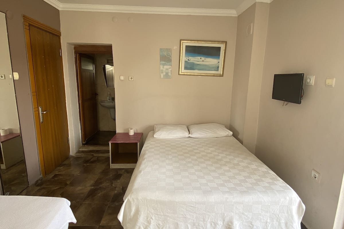 Habitación triple | Tabla de planchar con plancha