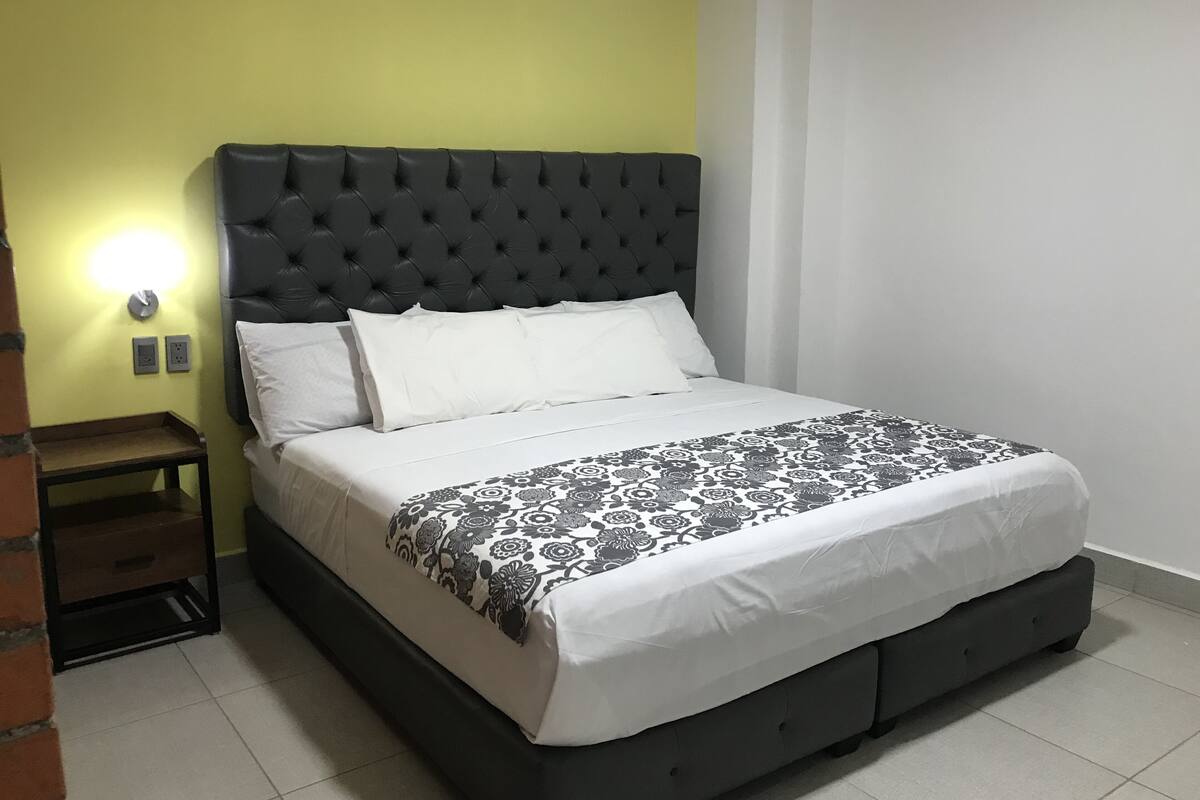 Elite Room | Blackout drapes, WiFi (free), bed sheets