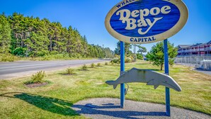 A whale watching sign at Depoe Bay Capital. - Cloud Nine (Depoe Bay)