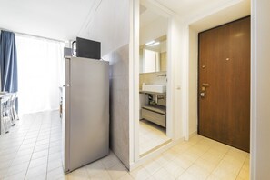 Interior - GuestHost - The apartment is located on the third floor of a building without a lift.It comfortably accommodates 4 people in 60 mqs,, with a double bed, two single beds and a sofa bed in the living room.The accommodation is strategically located, a 5-min (Milano)
