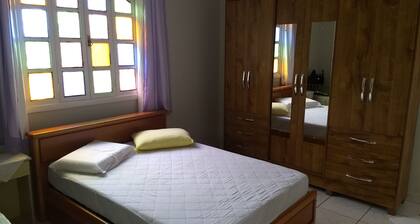 House with Colonial veranda - lawn space