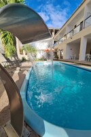 Outdoor pool, open 8:00 AM to 8:00 PM, sun loungers